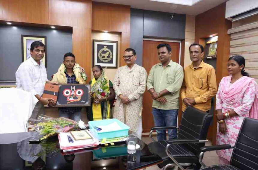 Shubham Sahu Jajpur Matric Topper 2026 honored with his mother by MP Dr. Rabindra Narayan Behera and Collector Ambar Kumar Kar